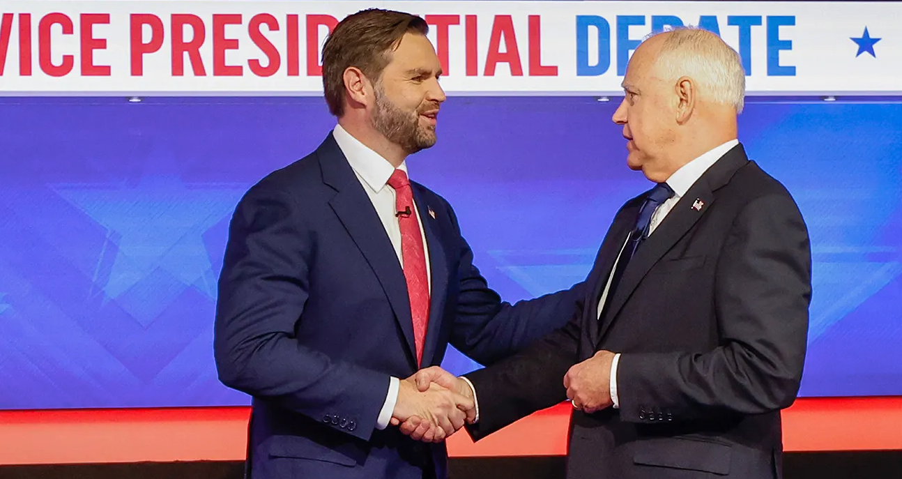 JD Vance and Tim Walz shake hands at VP Debate